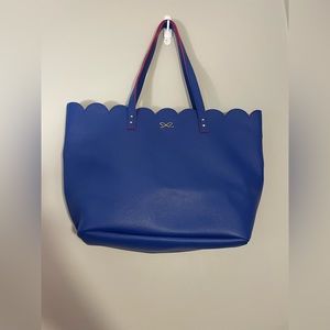 Bath & Body works leather scalloped bag in new condition it’s a must see!!